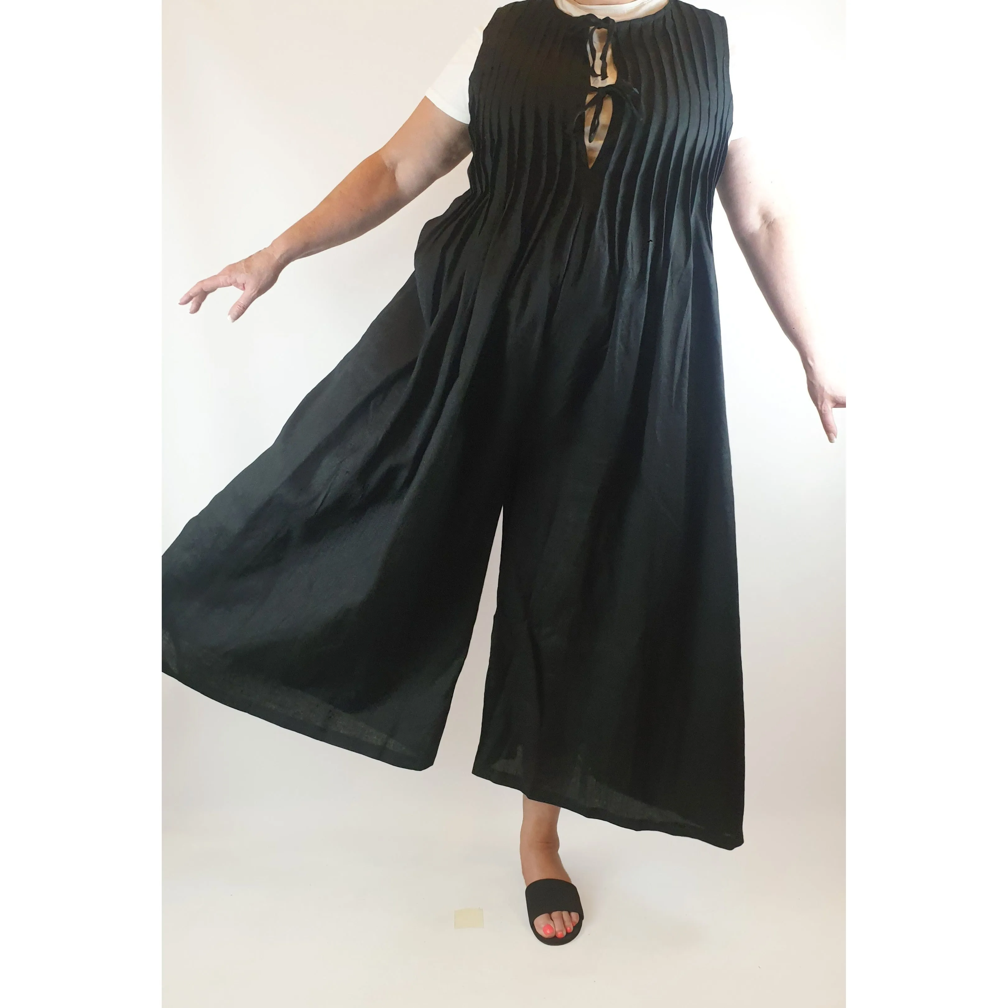 Black linen feel sleeveless wide leg jumpsuit with flattering front pleating size 2XL