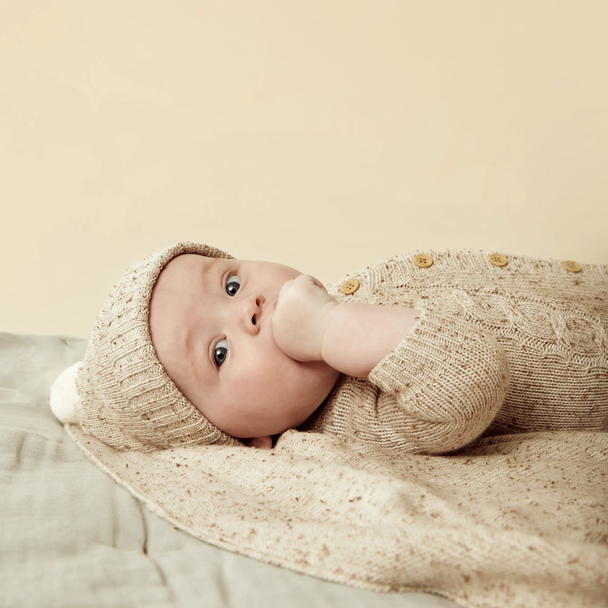 Wilson   Frenchy Knitted Cable Growsuit - Almond Fleck